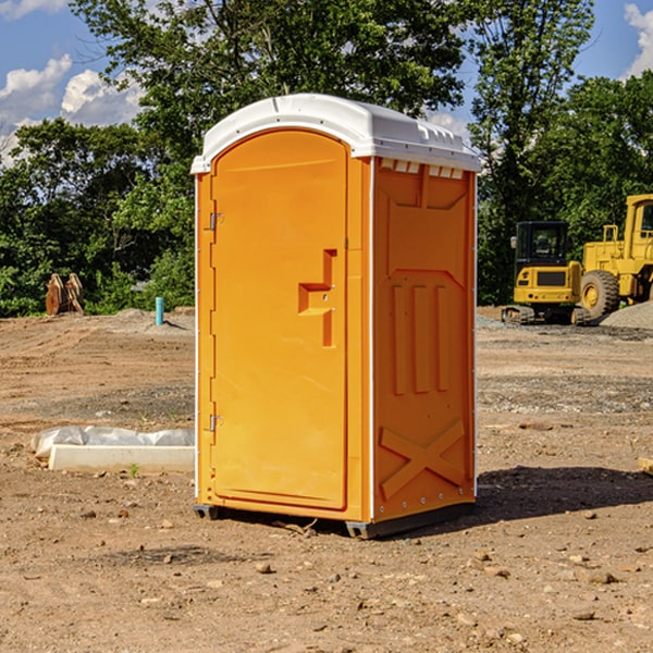 how often are the portable restrooms cleaned and serviced during a rental period in Manor